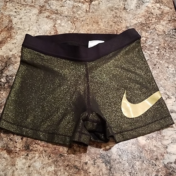 gold nike pro shorts